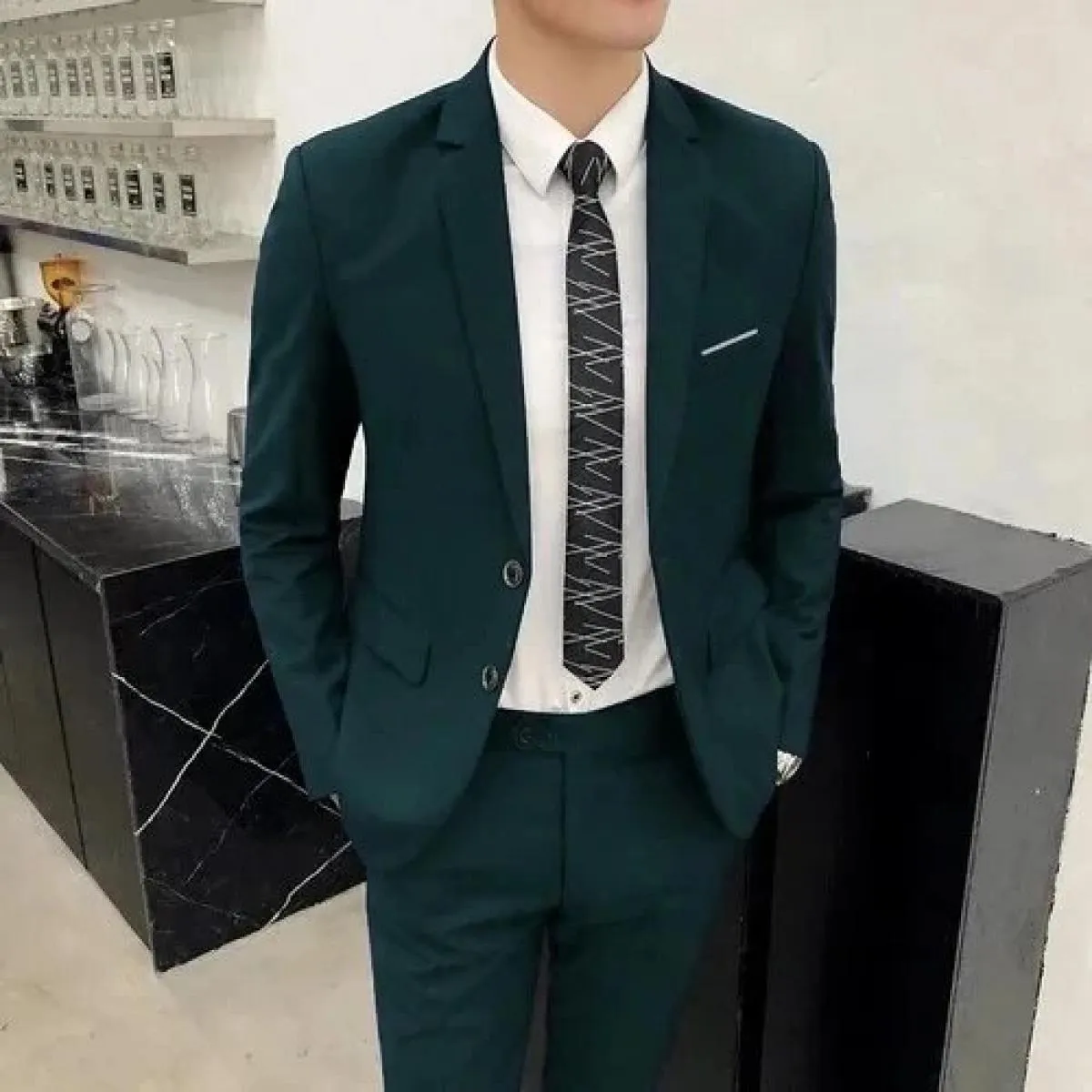 Giacca da uomo New Business Casual con un bottone in tre pezzi Giacca con risvolto Western Fit Abito da uomo moda Groomsmen e ab
