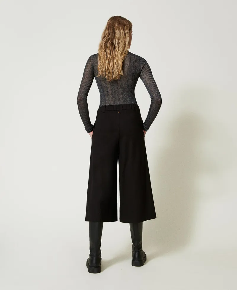 Pantaloni cropped a vita alta