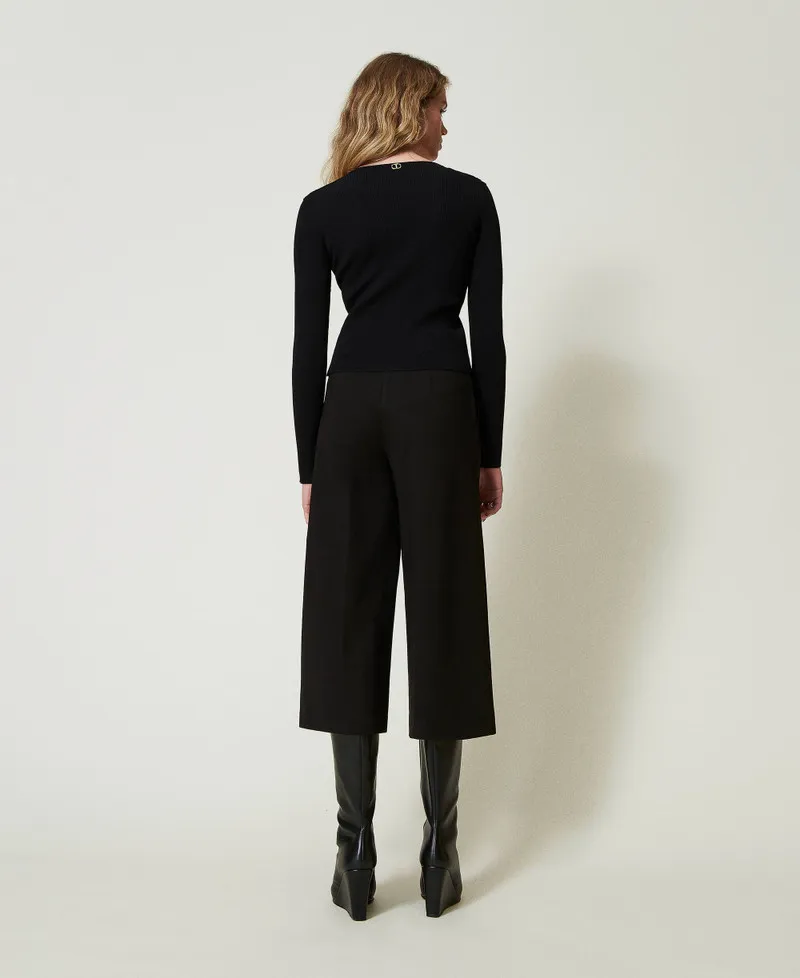 Pantaloni cropped con cinturino Oval T
