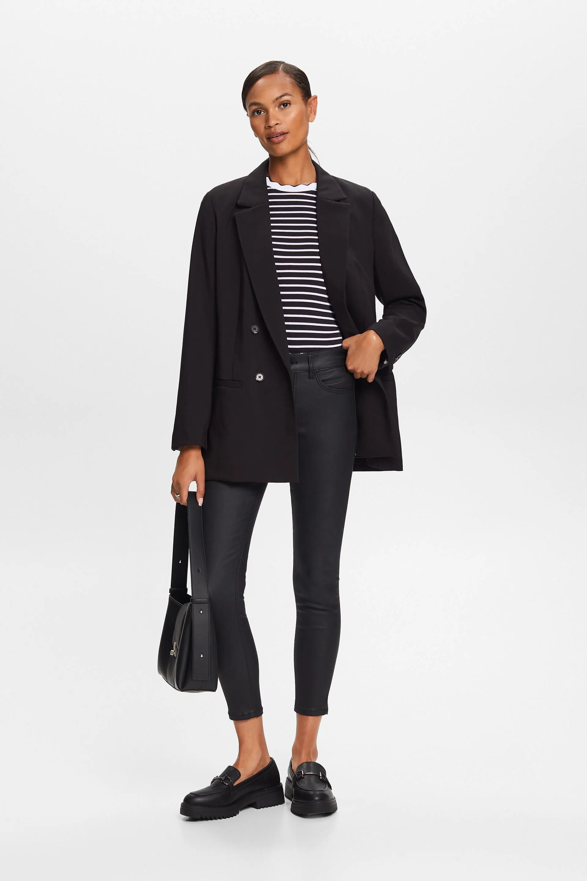 Pantaloni rivestiti a vita media e gamba skinny